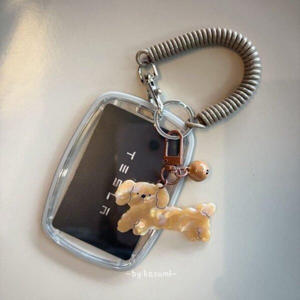 806ba0b498e7c45c40dce90ee152529730062ea4 シンプルで可愛いトレカケース 可愛いイヌチャーム付き 高品質ケース